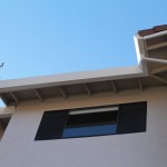 Custom 4" Bottom Fascia Gutter, 3 1/8" Galv Downspout with smooth elbows