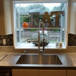 Custom 16 Ga Stainless Steel Countertop with integral drainboard and Vibration Finish