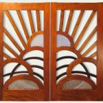 Wooden gate with perforated copper
